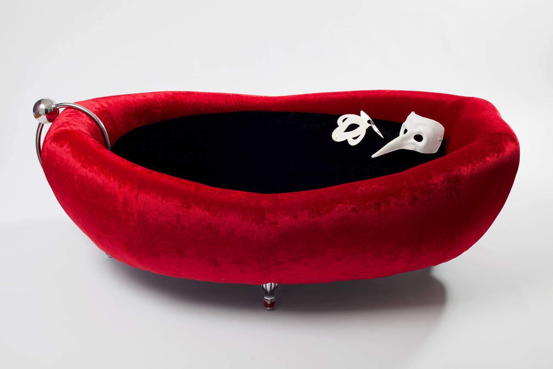 The Deep Throat red lips sofa with masks and removable inox piercing